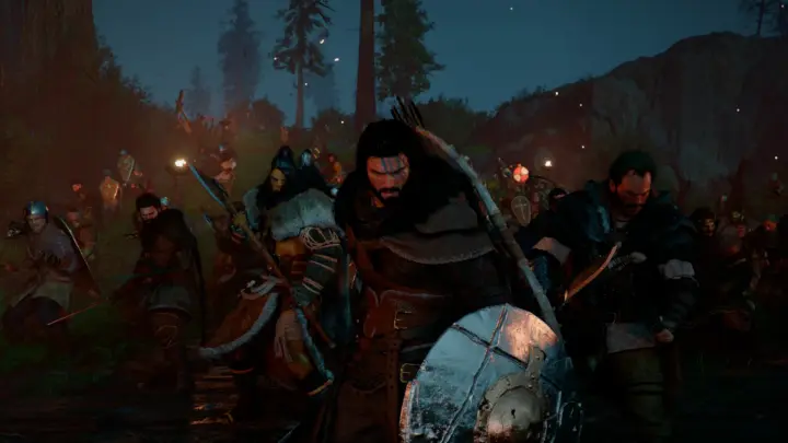Crimson Desert Review: A Great World, a Demanding Game 6 Kliff and armed companions stand together in a torchlit forest at night.