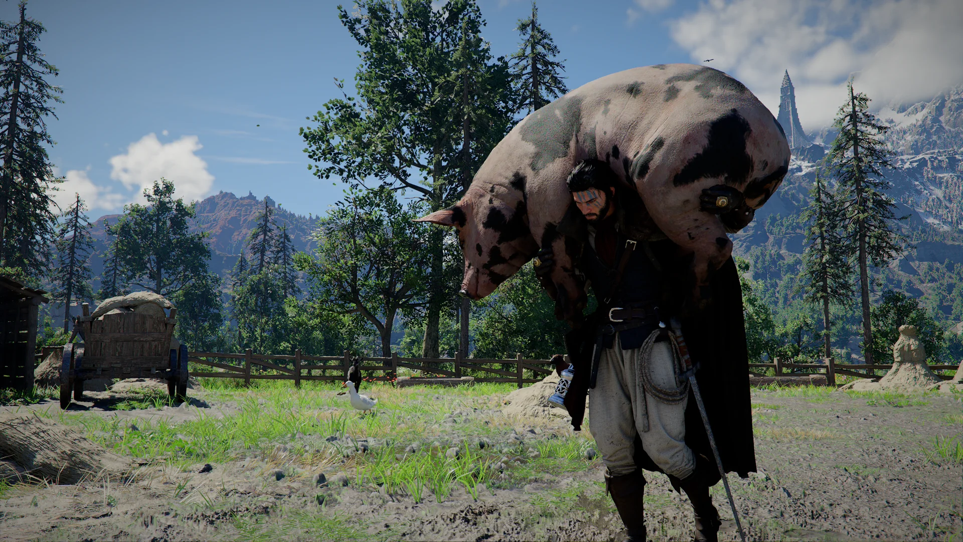 Kliff carries a spotted pig over his shoulder beside a wooden cart and trees.